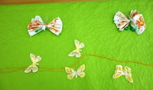 selbstgebasteltee Schmetterlinge als Tischdeko